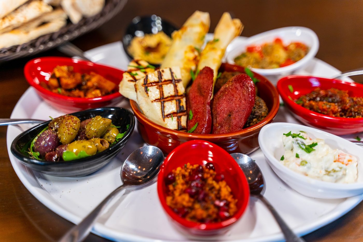A meze platter with dips and grilled halloumi